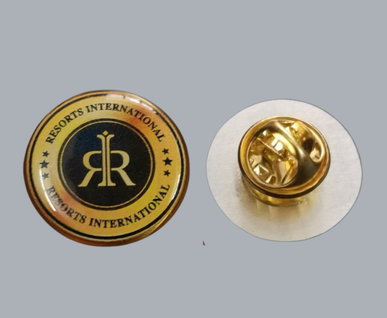 Pin cài áo inox in UV